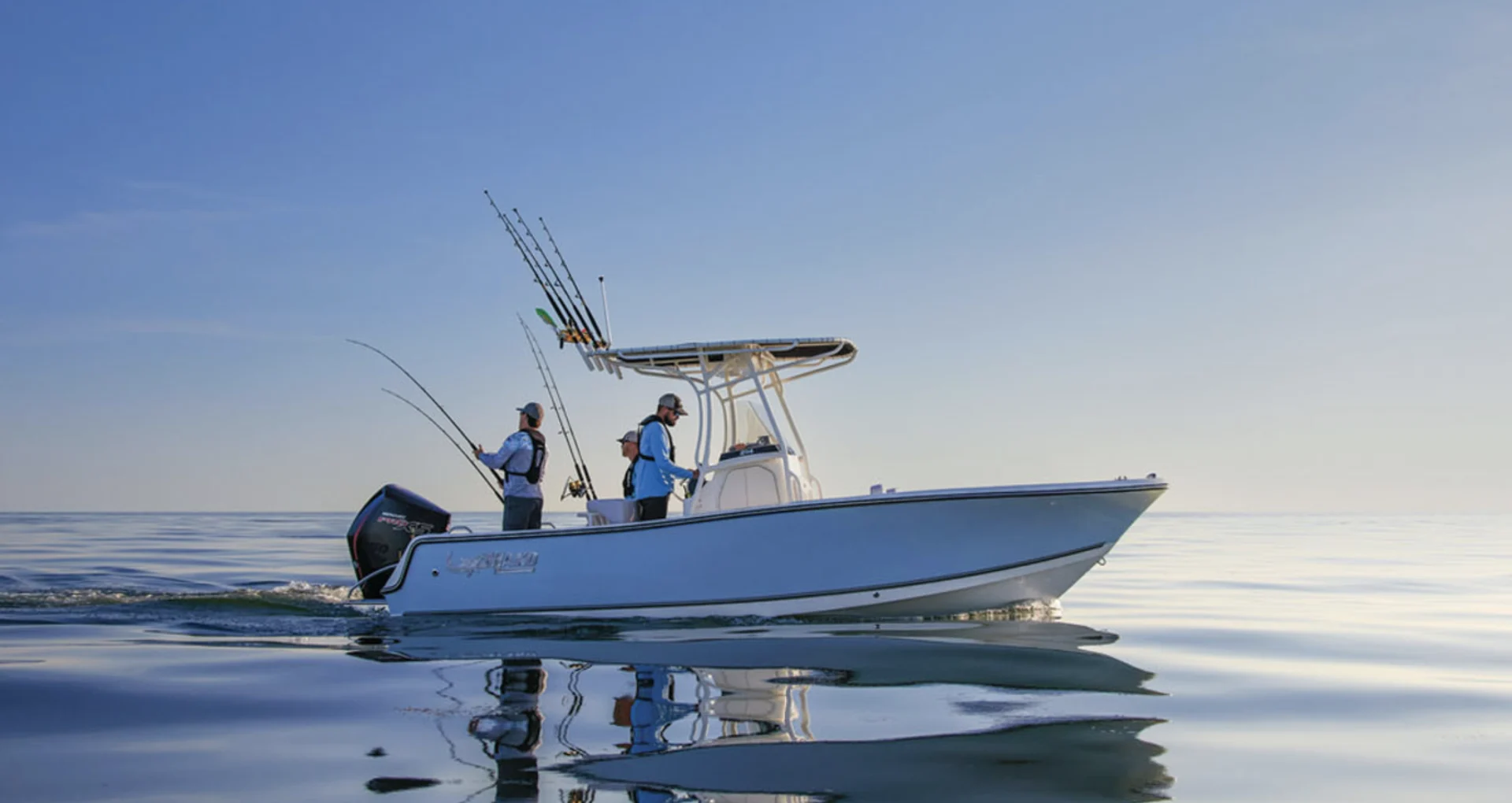 Mako center console fishing boat cruising on open water, highlighting Mako boats for offshore and sport fishing at Grand Pointe Marina