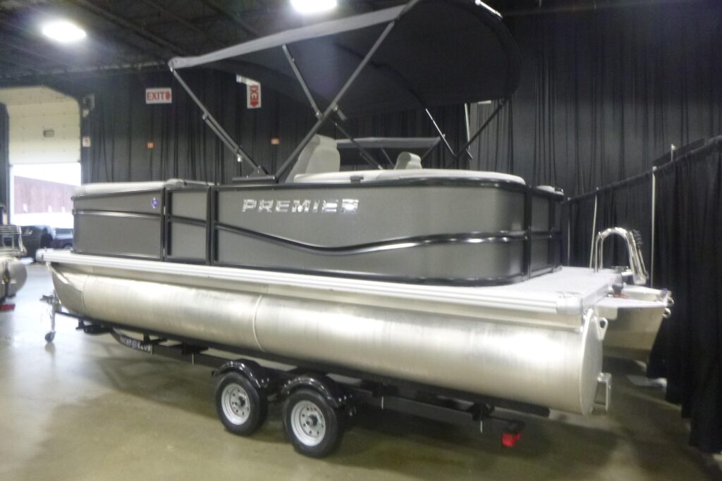 2026 Premier 200 SunSation RF pontoon boat on trailer indoors