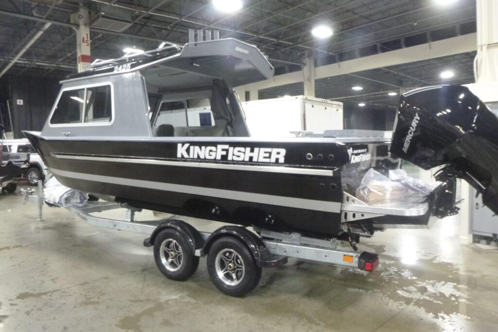 KingFisher 2425 Escape HT boat displayed at an indoor boat show