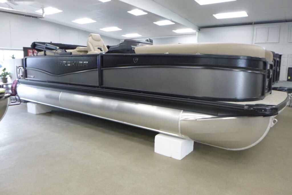 2026 Premier 230 Sunsation RF CL pontoon boat displayed indoors at Grand Pointe Marina showroom