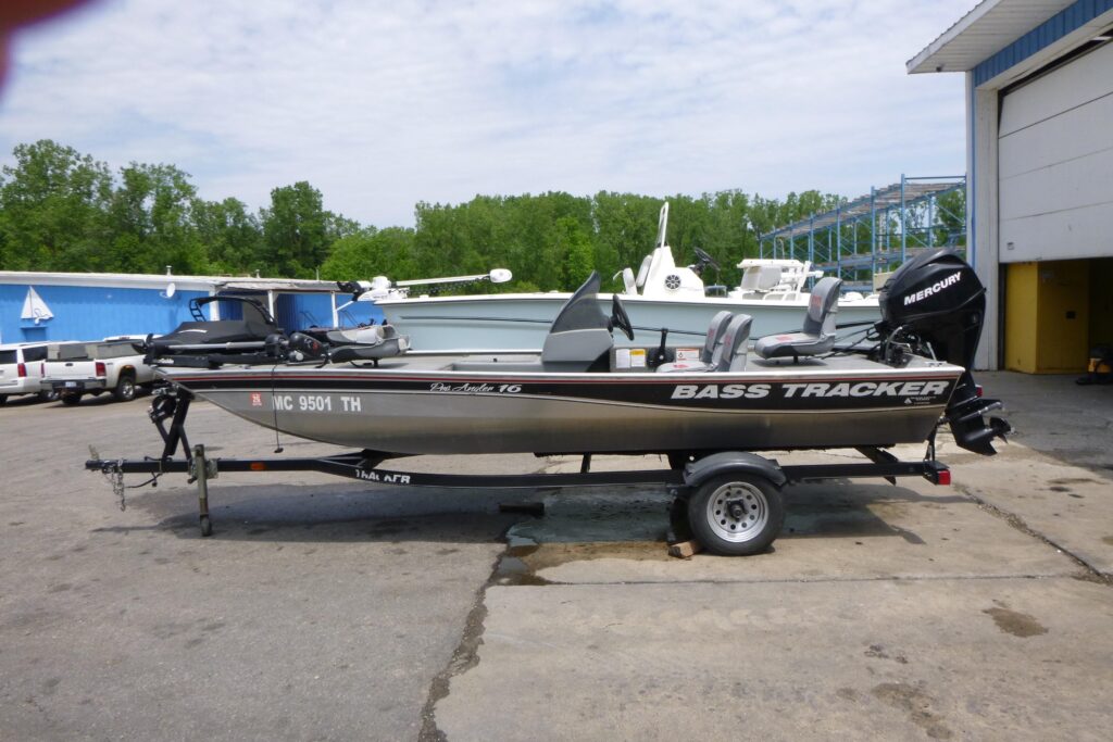 2011 Tracker Pro Angler 16 fishing boat on trailer with Mercury outboard motor and trolling motor