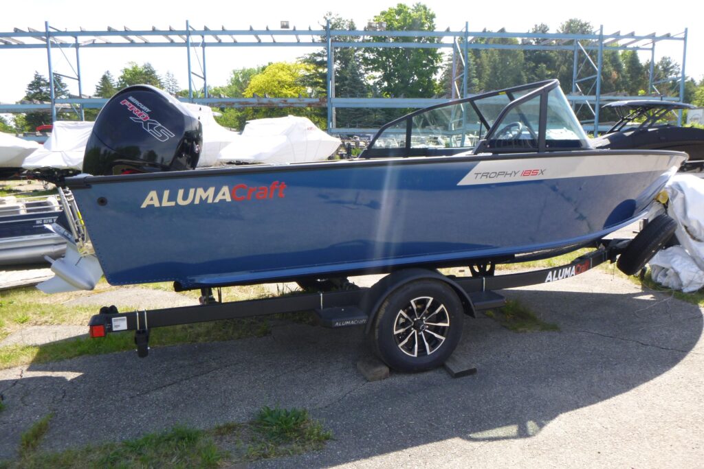 2025 Alumacraft Trophy 185X Sport fishing boat on trailer at Grand Pointe Marina