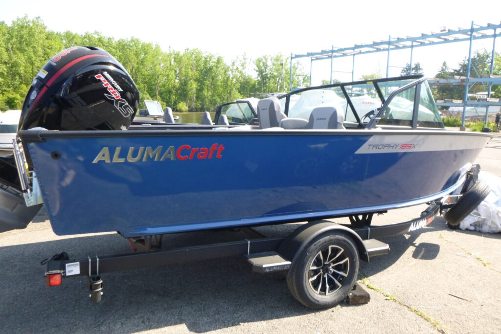 2025 Alumacraft Trophy 185X Sport fishing boat with Mercury outboard on trailer at Grand Pointe Marina