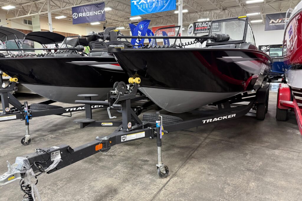 2026 Tracker Targa V-19 WT fishing boat on trailer with black hull, windshield, and bow trolling motor
