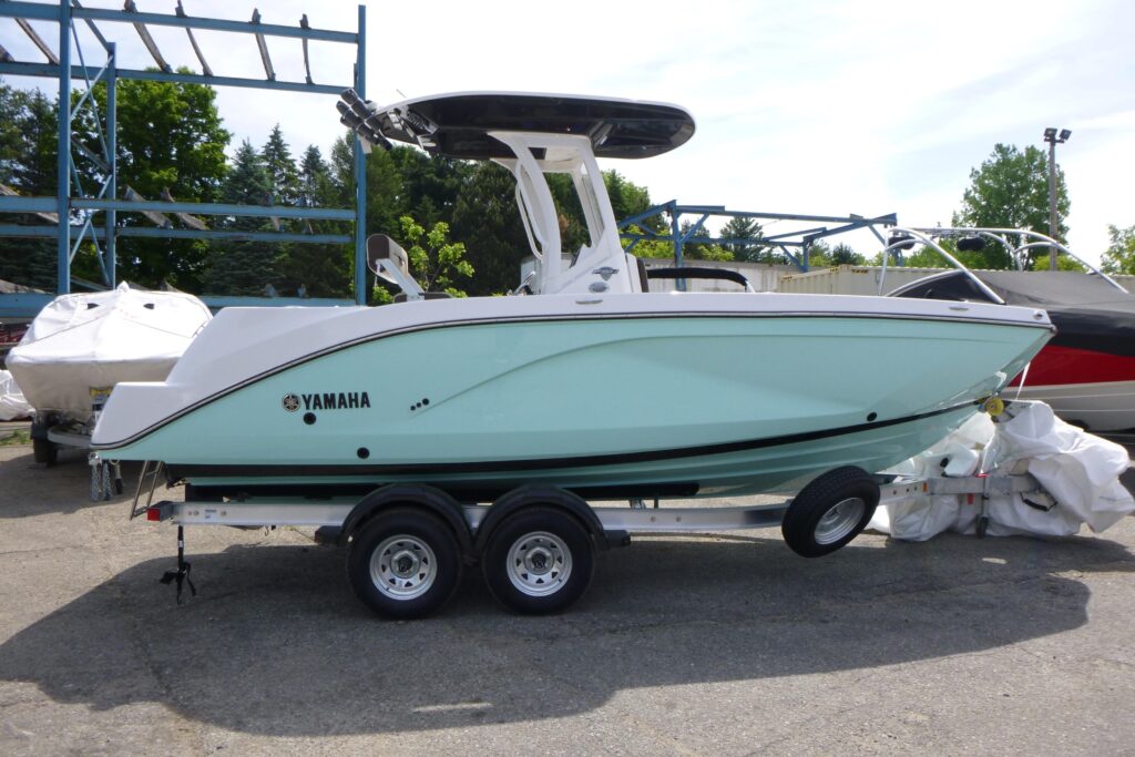 2026 Yamaha 222 FSH Sport E center console boat on trailer at Grand Pointe Marina