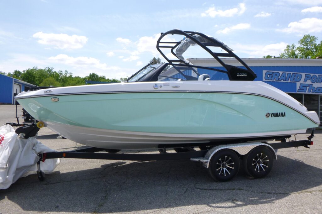 2026 Yamaha 222S jet boat with black wakeboard tower on trailer at Grand Pointe Marina